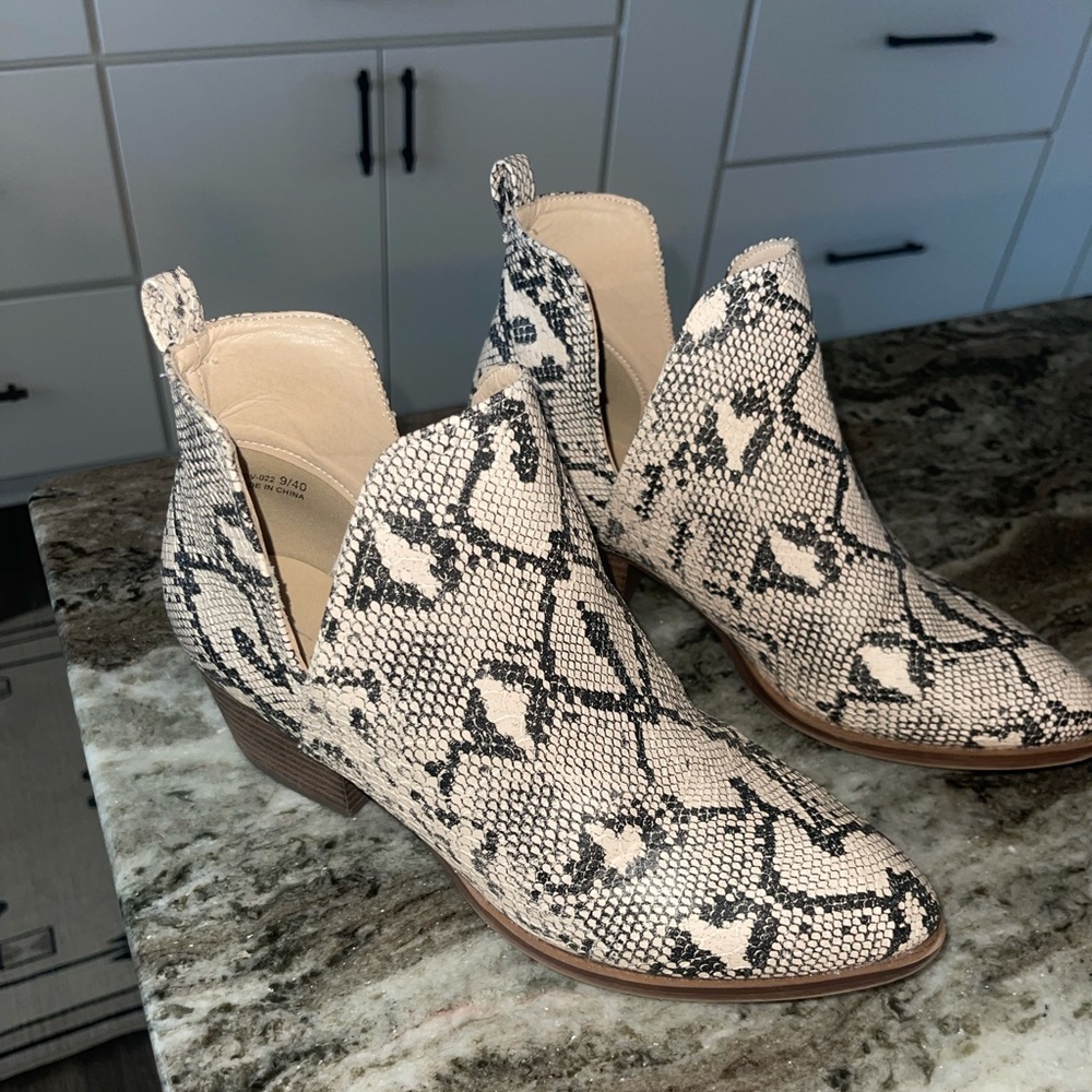 Snake skin boutique booties.